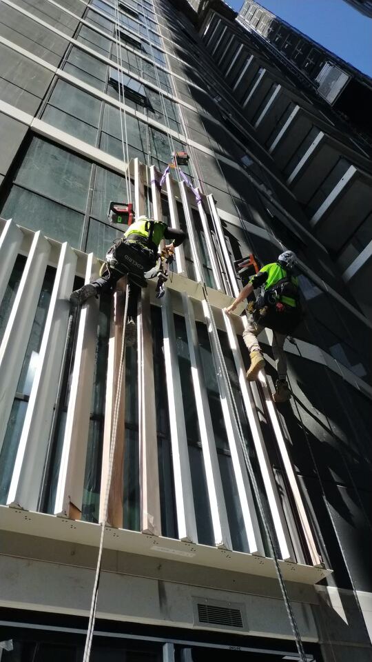Architectural aluminium ribbon façade element installation at 66 Hope Street
