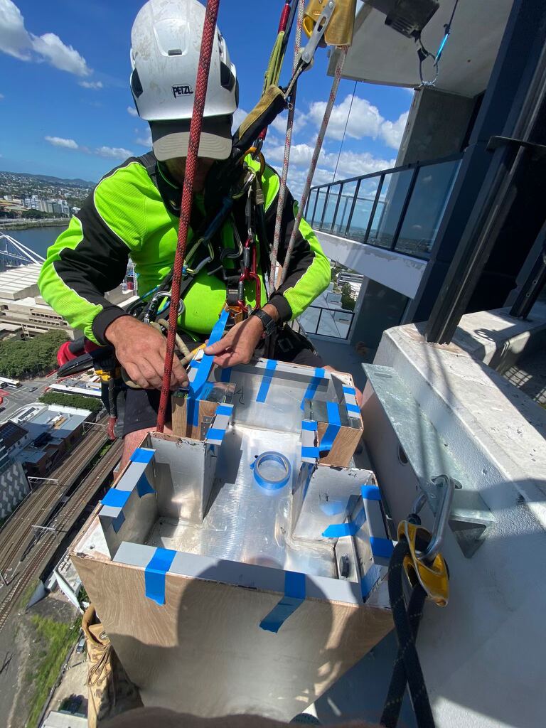 Upper House South Brisbane glazing and cladding installation via rope access